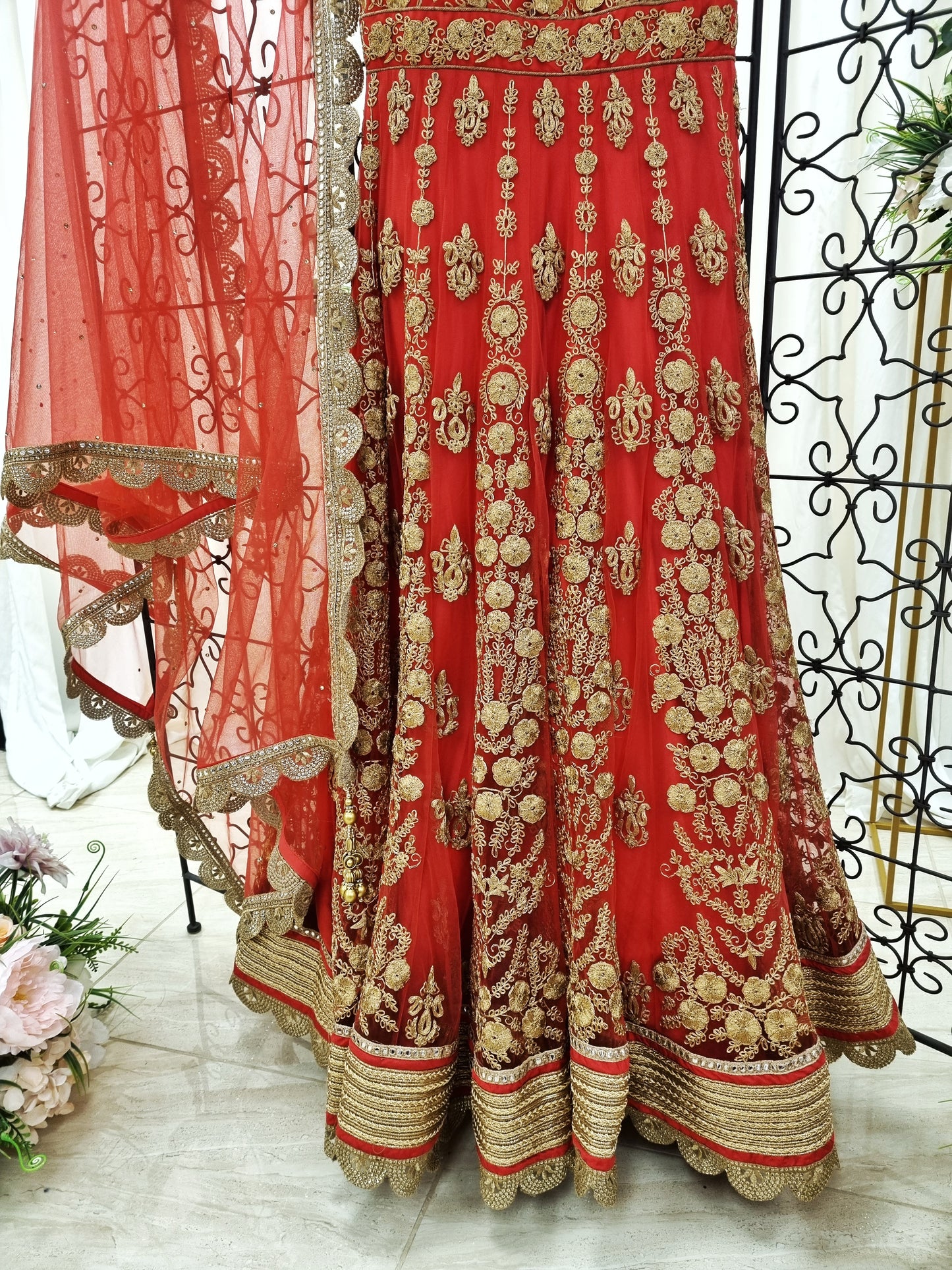 Heavy red and gold gown