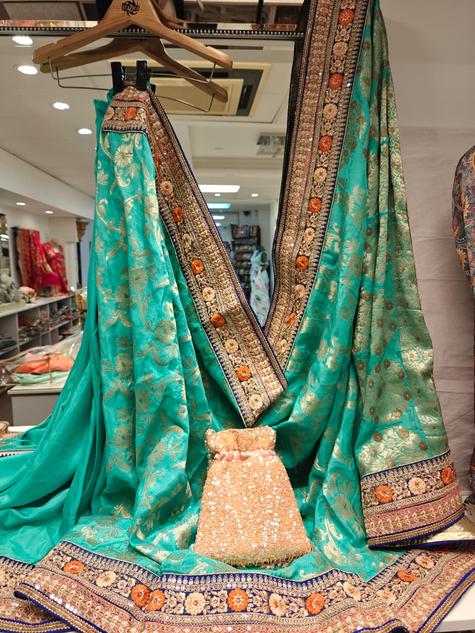 Turquoise & Gold Embroidered Saree