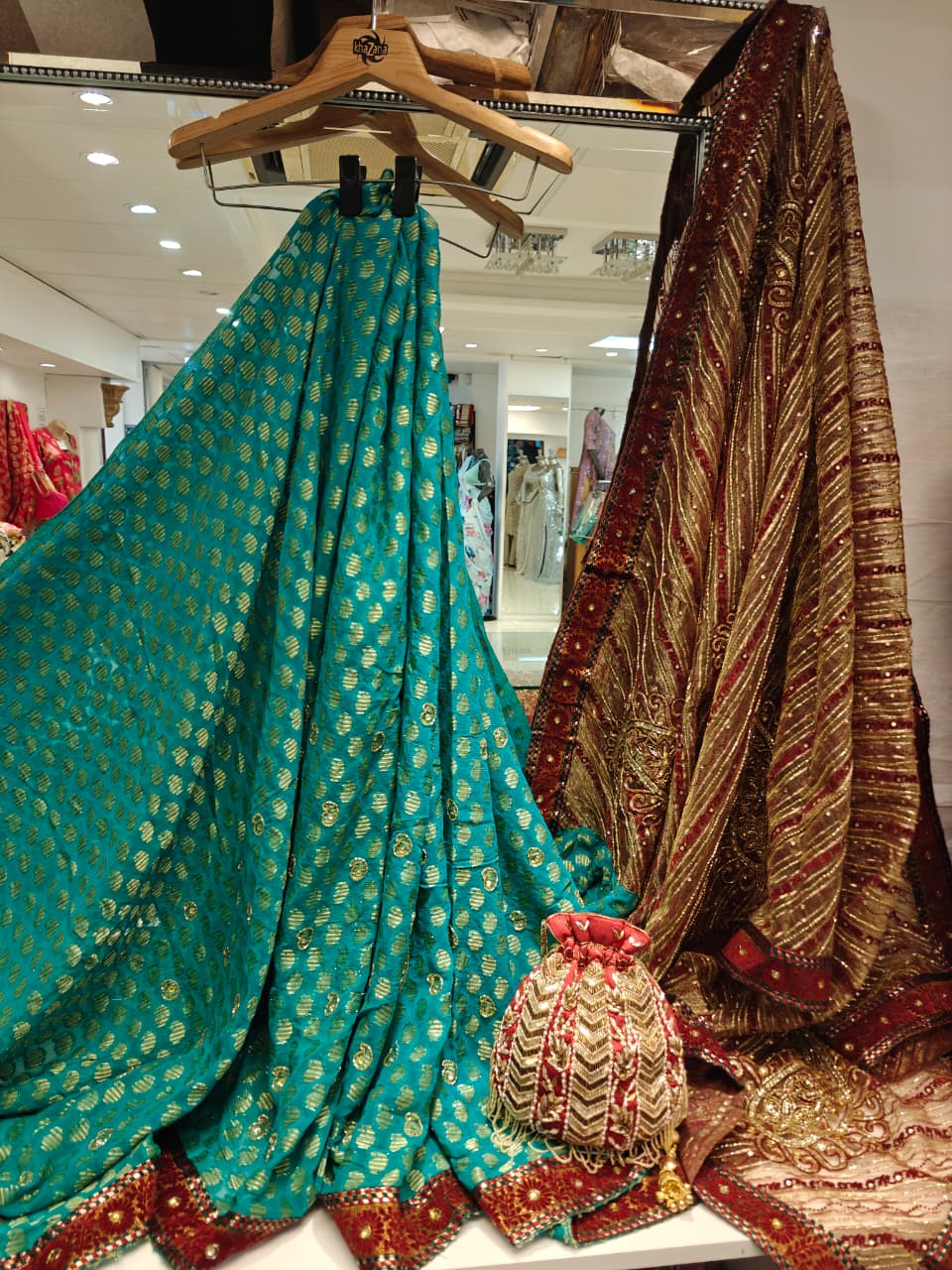 Teal & Maroon Embroidered Saree