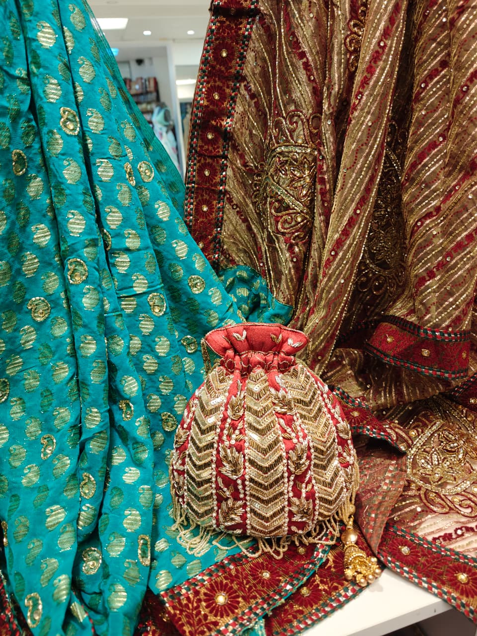 Teal & Maroon Embroidered Saree