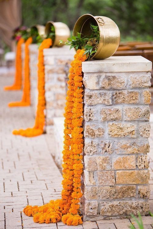 Marigold Cascade with Brass Pots