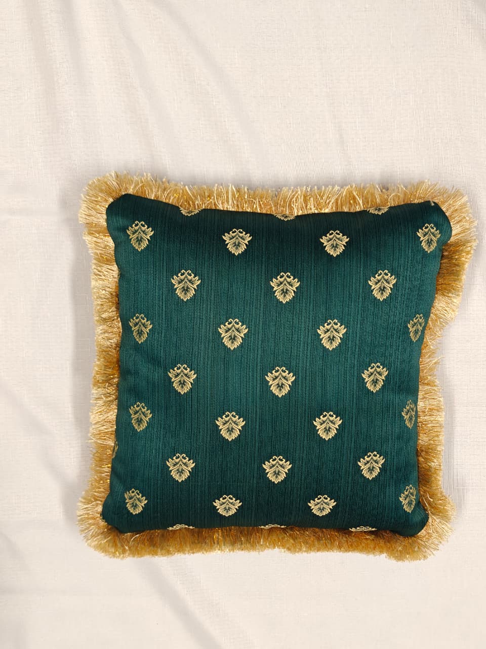 Crest Embroidered Fringe Cushion